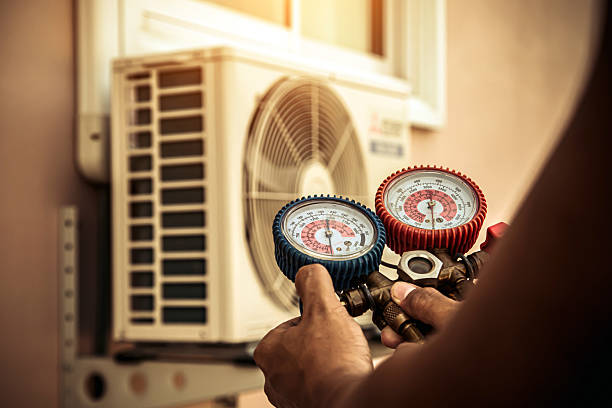 Professional Hvac technician working in Manson, WA